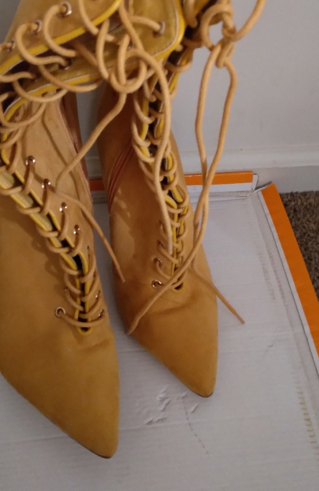 Tall mustard color tie up boot
